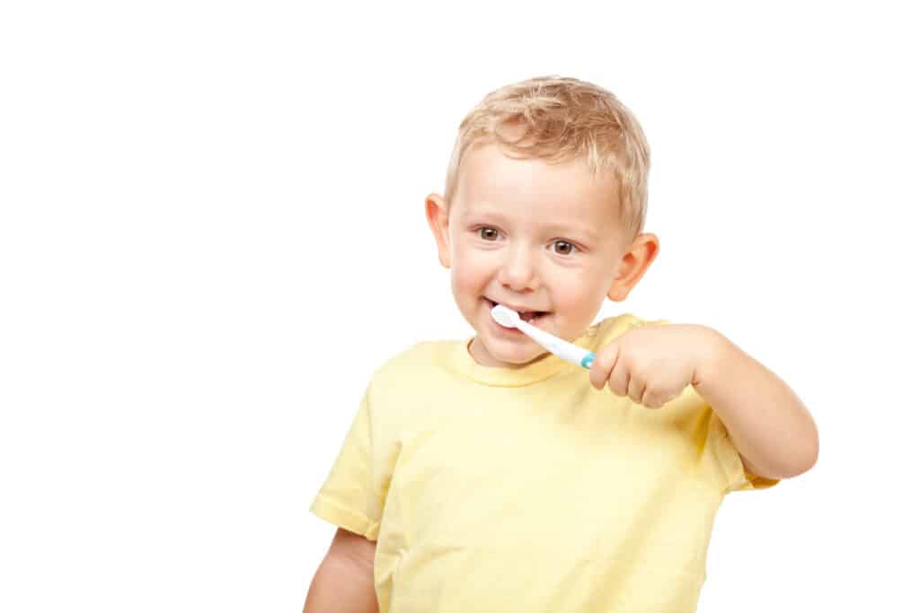 Boy brushing teeth 772031 1